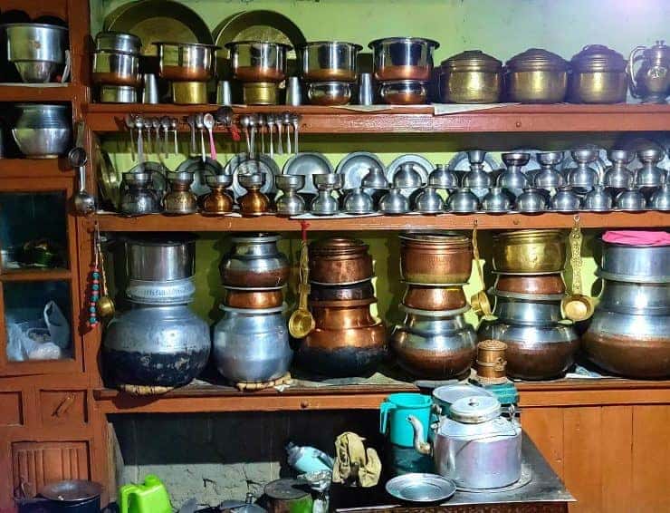 A kitchen with a lot of pots and pans.